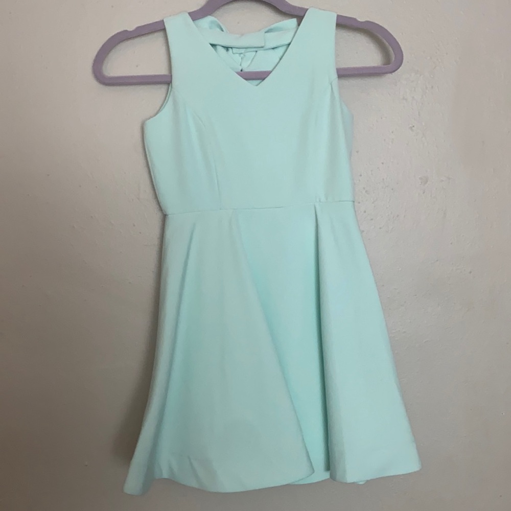 Mint Green Dress with adorable Bow in back. Size 8